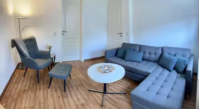 Ein Sitzbereich in der Unterkunft Ferienhaus Spatzenvilla