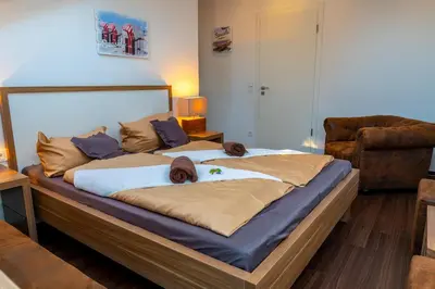 Ein Bett oder Betten in einem Zimmer der Unterkunft Seaside-Townhouse
