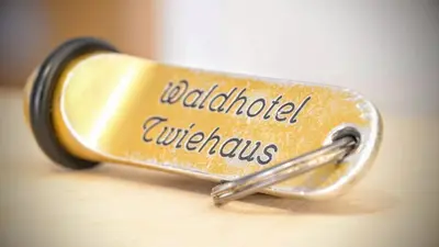 Ein Zertifikat, Auszeichnung, Logo oder anderes Dokument, das in der Unterkunft Waldhotel Twiehaus Garni ausgestellt ist