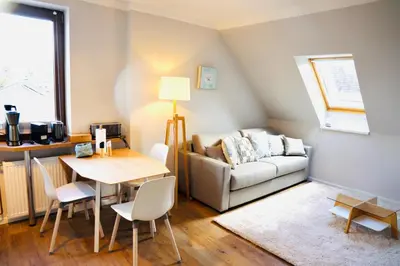Ein Sitzbereich in der Unterkunft Apartments Meerzeit C