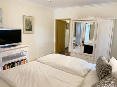 Ein Bett oder Betten in einem Zimmer der Unterkunft Ostseehaus Dreesen