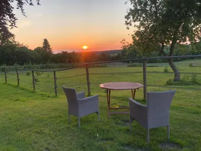 Blick auf den Sonnenuntergang/Sonnenaufgang von der Ferienwohnung aus oder aus der Nähe