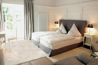 Ein Bett oder Betten in einem Zimmer der Unterkunft Landhaus Töpferhof bei Travemünde