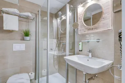 Ein Badezimmer in der Unterkunft Hotel Strandschlösschen