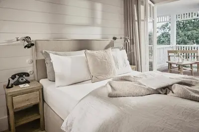 Ein Bett oder Betten in einem Zimmer der Unterkunft The Cozy Hotel & Lofts Timmendorfer Strand