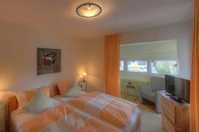 Ein Bett oder Betten in einem Zimmer der Unterkunft Aparthotel Klara