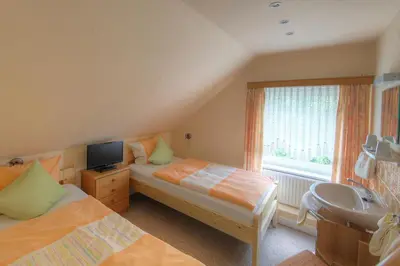 Ein Bett oder Betten in einem Zimmer der Unterkunft Aparthotel Klara