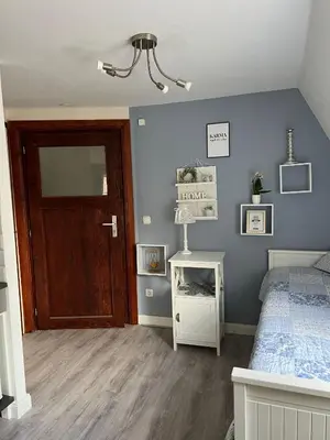Ein Bett oder Betten in einem Zimmer der Unterkunft Ferienhaus Wiethüchter