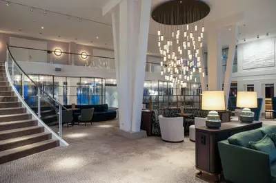 Ein Sitzbereich in der Unterkunft Radisson Blu Senator Hotel, Lübeck