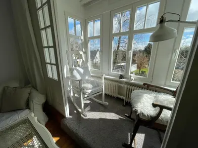 Ein Sitzbereich in der Unterkunft romantische Ferienwohnung Sachsenhof 2