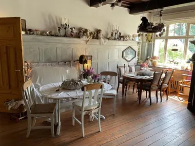 Ein Sitzbereich in der Unterkunft romantische Ferienwohnung Sachsenhof 3