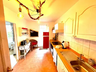 Küche/Küchenzeile in der Unterkunft romantische Ferienwohnung Sachsenhof 3