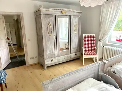 Ein Bett oder Betten in einem Zimmer der Unterkunft romantische Ferienwohnung Sachsenhof 3