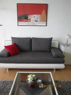 Ein Sitzbereich in der Unterkunft Seeblick Apartment - in Plaza (Maritim) Residenz