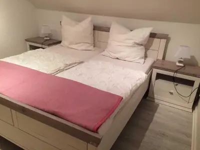 Ein Bett oder Betten in einem Zimmer der Unterkunft Ferienwohnung Möwennest