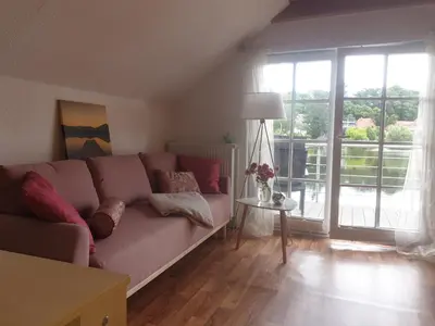 Ein Sitzbereich in der Unterkunft Apartment am Stadtsee