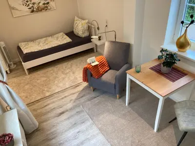 Ein Bett oder Betten in einem Zimmer der Unterkunft Gästehaus Langhals