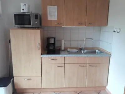 Küche/Küchenzeile in der Unterkunft Landhaus-Marwede App 4