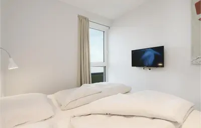 Ein Bett oder Betten in einem Zimmer der Unterkunft Priwallpromenade 1, Whg 5