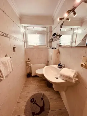 Ein Badezimmer in der Unterkunft Ostseehaus Dreesen Souterrain