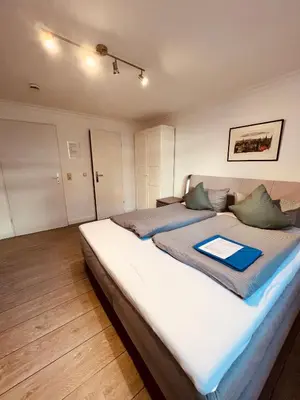 Ein Bett oder Betten in einem Zimmer der Unterkunft Ostseehaus Dreesen Souterrain