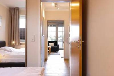 Ein Bett oder Betten in einem Zimmer der Unterkunft (DKK9b) Ferienwohnung Seestern