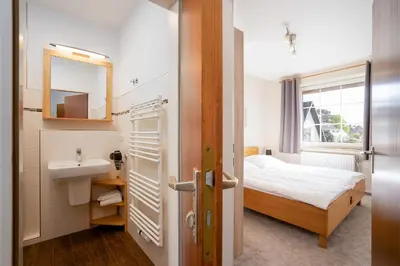 Ein Bett oder Betten in einem Zimmer der Unterkunft (DKK9)- Ferienwohnung Möwennest