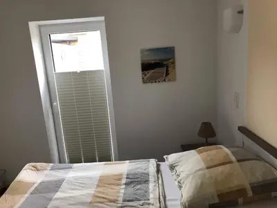 Ein Bett oder Betten in einem Zimmer der Unterkunft Ferienwohnung Völker