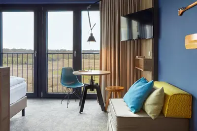 Ein Sitzbereich in der Unterkunft arborea Marina Resort Neustadt