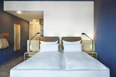 Ein Bett oder Betten in einem Zimmer der Unterkunft arborea Marina Resort Neustadt