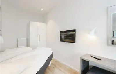 Ein Bett oder Betten in einem Zimmer der Unterkunft Highend Travemünde - Whg 102