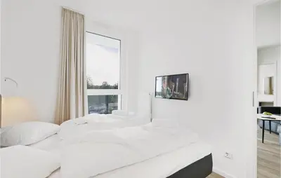 Ein Bett oder Betten in einem Zimmer der Unterkunft Highend Travemünde - Whg 108