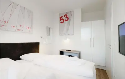 Ein Bett oder Betten in einem Zimmer der Unterkunft Highend Travemünde - Whg 110