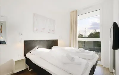 Ein Bett oder Betten in einem Zimmer der Unterkunft Highend Travemünde - Whg 110