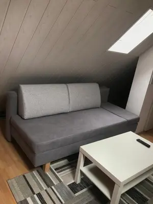 Ein Sitzbereich in der Unterkunft Ferienwohnung am Uniklinik