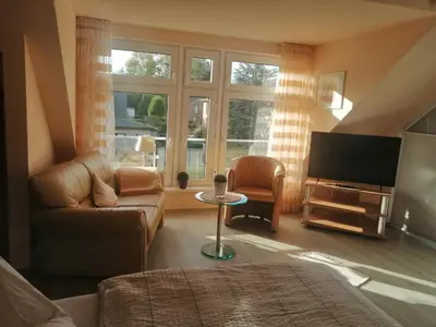 Ein Sitzbereich in der Unterkunft Ferienhaus Krabbe 1 Schmiedeberg Timmendorfer Strand Niendorf