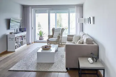 Ein Sitzbereich in der Unterkunft Techts Apartmenthaus