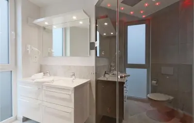 Ein Badezimmer in der Unterkunft Dünenvilla 3, Whg 3