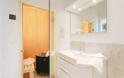 Ein Badezimmer in der Unterkunft Dünenvilla 4, Whg 5