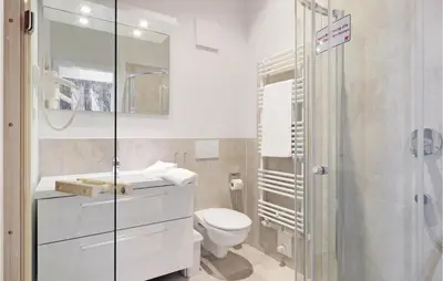 Ein Badezimmer in der Unterkunft Dünenvilla 5, Whg 5