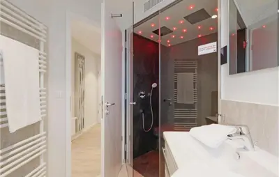 Ein Badezimmer in der Unterkunft Dünenvilla 6, Whg 4