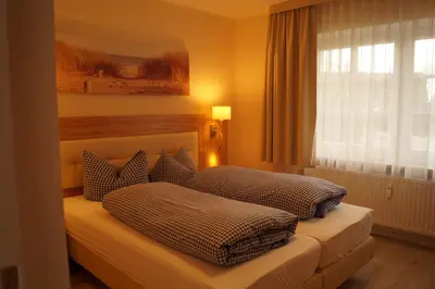Ein Bett oder Betten in einem Zimmer der Unterkunft Landhotel Klempau