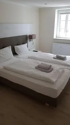 Ein Bett oder Betten in einem Zimmer der Unterkunft Landhotel Klempau