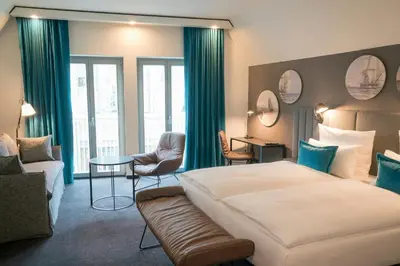 Ein Bett oder Betten in einem Zimmer der Unterkunft Motel One Lübeck