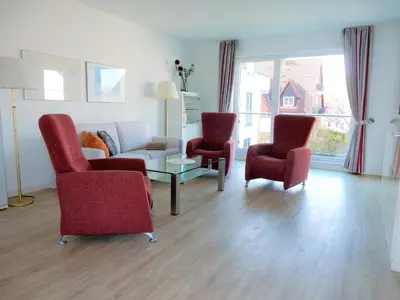 Ein Sitzbereich in der Unterkunft Exklusive familienfreundliche Ferienwohnung im Haus Aalbeek