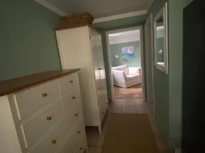 Ein Bett oder Betten in einem Zimmer der Unterkunft Gästehaus Melz Schwabe