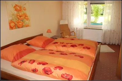 Ein Bett oder Betten in einem Zimmer der Unterkunft Ferienwohnung Fohrmann