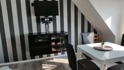 Ein Sitzbereich in der Unterkunft Ferienwohnung Haffkrug Seebrücke