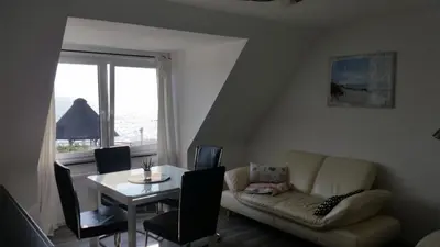 Ein Sitzbereich in der Unterkunft Ferienwohnung Haffkrug Seebrücke