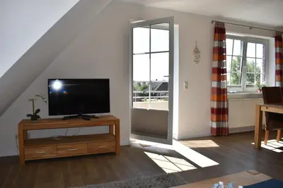 TV/Unterhaltungsangebot in der Unterkunft Am Pool und Strand 8